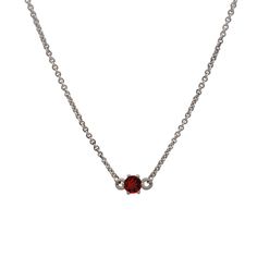 Natural Round Garnet Necklace in Sterling Silver. This solitaire necklace is 16 inches in length and is perfect for everyday wear! If shorter necklaces are more your thing we offer this necklace in 14 inches as well. A 14 inch necklace will be slightly shorter than the one pictured above. Garnet 5mm Approximately 0.60 carats total weight AA Grade Sterling Silver USA Made Garnets are considered a lucky stone. Garnets are the birthstone for January. Every piece of this necklace is made in the USA; however, stones are sourced and cut throughout the world. Due to the natural origin of this stone colors may vary. Please remember photos typically do not do gems justice.  Each piece of jewelry from Hidden Starfish is made in the USA and casted from ethically mined and recycled metals. All gemston January Birthstone Necklace, Lucky Stone, Solitaire Necklace, Garnet Necklace, Solitaire Necklaces, January Birthstone, Short Necklace, Birthstone Necklace, One Pic