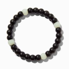 Eclipse UV Black Fortune Stretch Bracelet | Claire's US Rubber Bead, The Eclipse, Fashionable Jewelry, Jewelry And Accessories, White Beads, Black Rubber, Stretch Bracelet, Christmas List, Stretch Bracelets