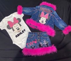 Custom Minnie Mouse 3pc set. Skirt, jacket and shirt. Perfect outfit for your little princess ❤️ Various themes are offered. Please message me for details. You can add fur and/or rhinestones!! In the description please include your child's name, age, sizes, desired colors is specific colors are requested, and the theme to confirm.  Please keep in mind that each order is custom made. They will be similar in product but every outfit IS NOT THE SAME. This item is not a licensed product. I do not cl Mickey And Minnie Baby Shower Shirts, Minnie Mouse First Birthday T-shirts & Tank Tops, Minnie Mouse Two Birthday Shirt, Minnie Mouse 2nd Birthday Party T-shirts & Tank Tops, Minnie Mouse Birthday Tshirts, Personalized Minnie Mouse Jean Jacket Pink, Minnie Mouse 3rd Birthday Outfit, Princess Minnie Mouse Shirt, Minnie Mouse Birthday Outfit Ideas