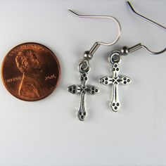 ♥ Cross Charm Earrings Cross Charm Cross Earrings Jesus Cross Charm Cross Gift Cross Pendant Coworker Gift Personalized Gift ♥ This is the beautiful Cross charm with a stainless steel ear hook ♥ You will receive 1 pair ♥ Alloy Cross charm 19x10.5x2 mm *earrings weight about 0.7 oz.* ♥ Hook Stainless steel 19 mm ♥ We strive for next day shipping, but we do not ship on Saturdays, Sundays, and Holidays. It may sometimes take a bit longer when we have unusually large volume of orders. Thank you for Nickel Free Adjustable Cross Earrings, Nickel-free Cross Earrings As Gift, Nickel-free Cross Earrings For Gift, Nickel-free Metal Cross Earrings, Handmade Metal Cross Earrings, Horn Bracelet, Earrings Cross, Personalised Bangle, Cross Gift