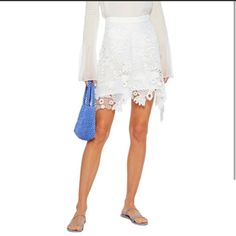 Antik Batik White Mini Skirt New No $Tag Pretty & Feminine “Thelma White Lace A Line Mini Skirt With Asymmetrical Hem From Antik Batik Features Size 40 M Eu/ Us M (Fits Best Size M/L) Please See Measurements Below For Best Fit A Line, Color White, All Lace, Asymmetrical Hem, Back Zip Closure, Fully Lined, 100% Cotton Measures Laying Flat Approx Waist 15” Hip 20” Excellent New Condition Retails $180 Summer Beach Lace Mini Skirt, Bohemian Lace Mini Skirt For Summer, Bohemian Lace Skirt For Vacation, Bohemian Style Short Mini Skirt, Bohemian Short Mini Skirt, Batik Skirt, Gold Mini Skirt, Beaded Skirt, Antik Batik