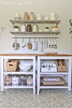 a kitchen area with shelves, pots and pans