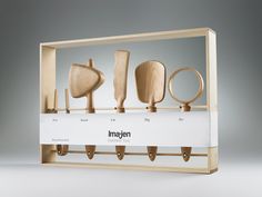 a display case with wooden objects in it