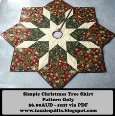 a quilted christmas tree skirt pattern on the floor