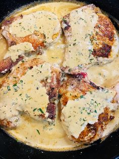 chicken with gravy in a skillet ready to be cooked and served for dinner