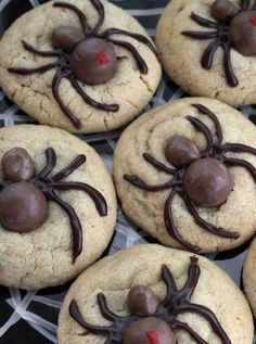 cookies with chocolate spider decorations on them