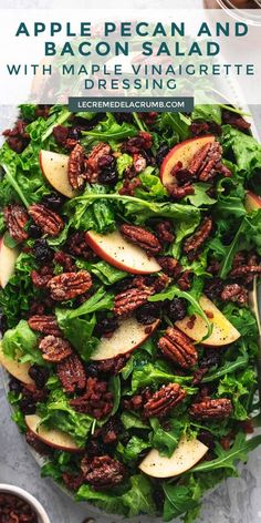 a salad with apples, pecans and cranberries in it on a plate