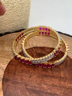 Traditional BanglesColor : GoldenStones : Red Stone AD Adjustable Red Stone Jewelry, Red Ruby Bracelet For Festive Occasions, Adjustable Red Jewelry With Stones, Red Ruby Bangle As Gift, Red Round Bangle For Party, Red Ruby Bracelets, Red Hand Set Bangle For Party, Red Stone Work Bangle For Festivals, Festive Red Ruby Bracelet