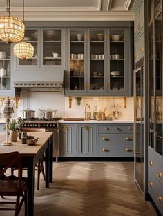 a kitchen filled with lots of counter top space next to a dining room table and chairs