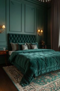 a bed with green comforter and pillows in a room that is painted teal