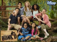 the cast of disney channel's live - action movie, bunno poses for a family photo