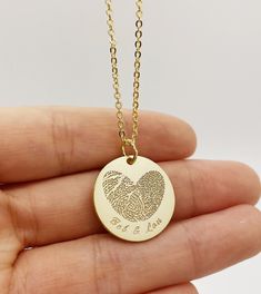 ACTUAL FINGERPRINT &HANDWRITING NECKLACE This necklace is personalized with actual fingerprint and handwriting you provide us.It is good for Christmas, Anniversary ,Birthday or Wedding gift. I T E M ∙ D E T A I L S 1. MATERIAL: GOLD-FILLED (hypoallergenic)    -14K Gold fill is a pressure-bonded layer of gold that has 100 times more gold than plated jewelry. It is durable, won't chip or flake, is tarnish-resistant, and is a great alternative to "karat" gold that is reasonably priced. Looks great Fingerprint Necklace, Baby Footprint, Baby Handprint, Handwriting Necklace, Baby Footprints, Pet Memorial Gifts, Plated Jewelry, Custom Necklace, Memorial Gifts