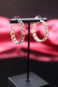 Gold Rope Chain Link Hoop Earrings feature a distinctive design combining the classic hoop shape with intertwined rope chain links, creating a stylish and textured look. The gold finish adds a touch of glamour to these earrings, making them a versatile accessory that seamlessly transitions from casual to more formal settings. Elegant Metal Jewelry With Chain Print, Elegant Small Hoop Chain Earrings, Elegant Small Hoop Earrings With Chain Detail, Trendy Hoop Earrings With Chain Detail, Earrings Making, Cz Bracelet, Gold Rope Chains, Chain Links, Hinged Bracelet