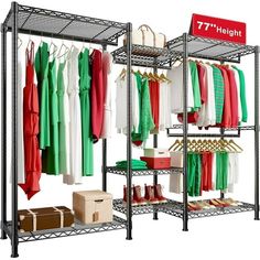 an open rack with clothes hanging on it and boxes under the racks next to it