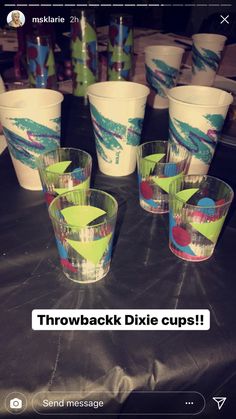 several cups with different designs on them sitting next to each other and the words throwback dixie cups