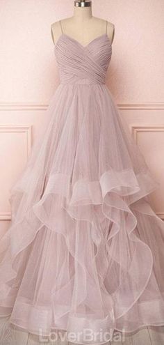 Tulle Gown With Spaghetti Straps For Prom, Elegant Spaghetti Strap Tulle Dress, Pink Formal Gown With Spaghetti Straps, Pink Spaghetti Straps Gown For Formal Events, Pink Spaghetti Straps Gown For Formal Occasions, Organza Dresses With Spaghetti Straps For Prom Season, Organza Dress With Spaghetti Straps For Prom, Organza Dresses With Tulle Skirt And Spaghetti Straps, Elegant Gown With Spaghetti Straps And Ruffles