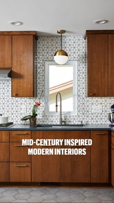 a kitchen with wooden cabinets and stainless steel appliances