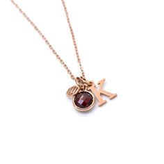 Discover elegance in simplicity with our Garnet January Birthstone Necklace featuring a personalised touch with your choice of an initial letter.   The 100% natural and untreated garnet, cut in briolette style, exudes brilliance visible on both sides for a symmetrical charm.  Garnet, the birthstone of January embodies love, tranquility and regeneration. Gift yourself or a loved one with these positive vibes associated. Own the moment, make it yours! Gold Plated Sterling Silver (mounting around t Rose Gold Birthstone Initial Pendant Jewelry, Rose Gold Birthstone Necklace For May, Gift, Gift Birthstone Necklace With Initial Pendant Gemstone, Valentine's Day Rose Gold Initials Charm Necklace, Rose Gold Birthstone Charm Necklace, 14k Gold Filled, January Birthstone Necklace, Gold Letter, Letter Charm, Necklace Chain Lengths