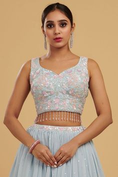 Buy Powder Blue Sequins Embroidered Raw Silk Designer Lehenga Online | Samyakk Lengha Blouse Designs, Sleeveless Blouse Designs, Long Skirt And Top, Simple Frock Design, Crop Top Lehenga, Lehenga Designs Simple, Latest Model Blouse Designs, Lehenga Blouse Designs, Fashionable Saree Blouse Designs