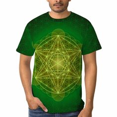 a man wearing a green t - shirt with an image of a flower of life on it