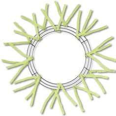 the circular frame is made up of green plastic sticks and has a white circle in the middle