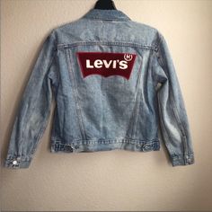 Levi’s Ex Boyfriend Trucker Jacket With Levi Patch New With Tags! No Flaws! Button Down Red Logo On Back Casual Red Denim Outerwear, Red Denim Jacket For Winter, Casual Red Long Sleeve Denim Jacket, Red Denim Jacket With Pockets, Vintage Red Denim Jacket For Fall, Casual Red Denim Jacket For Streetwear, Levi's Button-up Denim Jacket, Levi's Denim Jacket With Button Closure, Levi's Denim Jacket With Button Closure For Fall