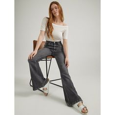 "(Previously known as Vintage Modern High Rise Flare Jean) With enough extra flare-legged fabric to dress an entire decade, our High Rise Flare Jean isn't just a '70s throwback; it's the real deal. Rekindled from patterns in our archives, this high rise creates a beautifully trimmed waistline, followed by a snug-yet-comfortable fit in the seat and thighs and a 33"" inseam length. With a wash inspired by a pair of archived bell bottoms, these look like they walked right outta Woodstock." 99% Cott Chic Flare Jeans With Flared Hem For Summer, Chic Flare Jeans For Summer, Retro Wide Leg Summer Flares, Summer Flare Jeans With Flared Hem, Retro Spring Flare Pants, Summer Retro Wide-leg Flares, Spring Vintage Fitted Flares, Spring Retro Flares, Modern Dark Wash Mid-rise Flare Jeans