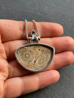 "Natural handcrafted Petoskey Stone and Smoky Topazpendant in 925 sterling silver and 1.5\" in height(including the bail). You can also purchase high quality 925 solid silver Italian popcorn chain that is 1.8 mm thick and with anti-tarnish finish. The chain is made in Italy and 925 stamped. ✓You purchase comes in the gift box ✓ Solid 925 Sterling Silver (925 parts per 1000) ✓ 925 Silver Hallmarked ✓ Every natural stone is different and exclusive in pattern and shape, and with its unique properti Untreated Sterling Silver Round Pendant, Untreated Teardrop Pendant Necklace For Gifts, Untreated Teardrop Pendant Necklace As A Gift, Untreated Sterling Silver Necklaces In Silver, Untreated Round Pendant Jewelry Gift, Untreated Sterling Silver Necklaces As Gifts, Untreated Silver Necklace As A Gift, Silver Sterling Silver Necklace, Untreated White Gold Jewelry Gift