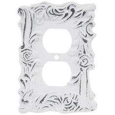 a decorative light switch plate with an ornate design on the front and back cover in white