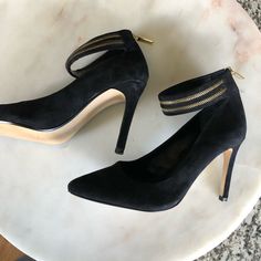 These Are A Gorgeous Pair Of Black Suede High Heels Designed By Banana Republic, They Are Nwot, 4” High Heel , Gold Zippers With Black Swede Around Ankle And Black Zipper Up Back Of Heel With Gold Clasps , Pointed Toe ( With Cleavage ) Size 7 1/2 ..Pair With Evening Gown Or Jumpsuit For Affairs Or With Jeans & Sweater For Sexy Out On The Town !! Chic Heels With Ankle Strap And Heel Tab, Chic Heels With Heel Tab And Ankle Strap, Party High Heels With Heel Tab, Suede High Heels, Designer High Heels, Gold Zipper, Evening Gown, Black Suede, High Heel