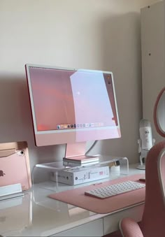 an apple desktop computer sitting on top of a desk