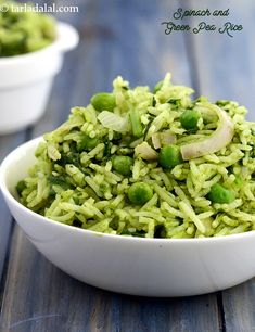 a white bowl filled with green rice and peas