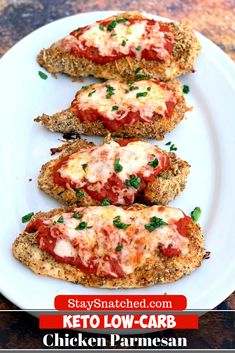 chicken parmesan is served on a white plate