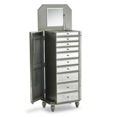 a silver jewelry cabinet with mirror on top and drawers below it, against a white background