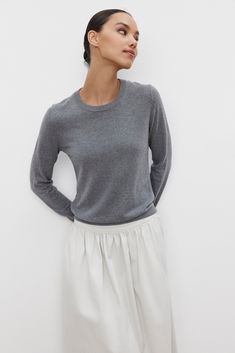 A person standing against a white background wears the Velvet by Graham & Spencer ROXY SWEATER in gray and a light-colored skirt Cami Shirt, Leather Outerwear, Cardigan Sweater Dress, Small Sweater, Dress The Population, Ribbed Neckline, Sweater Sale, Lightweight Sweater, Leather Blazer