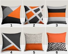 four pillows with different colors and patterns on them, all in the same design scheme