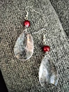 These 2 inch earrings have a clear tear drop bead and a single red accent bead. So simple but so cool! Red Teardrop Pearl Drop Earrings, Clear Teardrop Glass Earrings, Clear Teardrop Crystal Earrings For Pierced Ears, Clear Teardrop Crystal Earrings, Tear Drop Earrings, Drop Beads, Red Accents, So Cool, Tear Drop