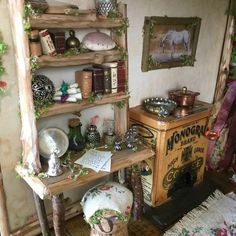 an old fashioned doll house with furniture and decor