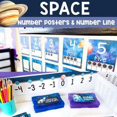 a space themed poster and number line display