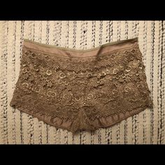 Champagne/Taupe Color Lace Shorts Beige Bottoms For Spring Parties, Beige Fitted Party Shorts, Beige Shorts For Night Out In Spring, Beige Fitted Shorts For Party, Beige Party Bottoms Short Length, Beige Summer Party Shorts, Brown Party Bottoms Short Length, Party Brown Short Bottoms, Party Brown Short Length Bottoms