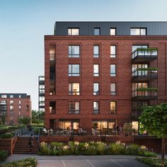 an artist's rendering of the exterior of a brick apartment building with people walking around