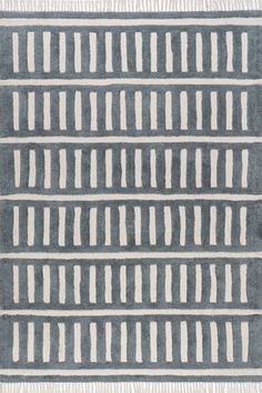 a gray and white rug with stripes on the bottom, one stripe is drawn across it