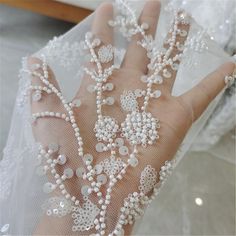 This Stunning Luxury High quality Embroidered Lace Fabric design piece has soft hand feel, ideal for use in DIY craft projects, wedding dress, clothing, party dress, dolls outfits, curtains, shams, lamp shades, headpieces, costumes, accessories, Apparel, handcraft Accessory, cake decor, unity candle, garters, headbands, dance costumes, belly dance costumes. --- THE DETAILS --- This listing is for 1 yard embroidery lace fabric. Wide: about 51inch/130cm Colors: off-white Material: Polyester, Sequi White Beaded Tulle Fabric For Wedding, Fabric Wedding Dress, Wedding Dress Fabric, Dolls Outfits, Beaded Lace Fabric, Tulle Flowers, Embroidered Lace Fabric, Wedding Dress Fabrics, Lace Bridal Gown