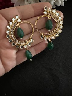 Adorable, effortless minimal and unique! A complete guide to cute outfits and style lover aesthetics❤️ This one is made for a charmer like you with all the love from Noorzaracollection! These beautiful hoop chandbali style earrings in green pearl hanging are ready to ship. Color : green Hand crafted and gold plated kundan indian/pakistani jewelry Material:brass,stone,gemstone,pearl  We bring you casual as well as party wear jewelry which comes with an attractive design and style. It goes well mo Bhavya Ramesh, Earrings Chandbali, Jewelry Hoop Earrings, Earrings Kundan, Jewelry Kundan, Desi Love, Jewelry Pakistani, Kundan Jewelry, Chandbali Earrings