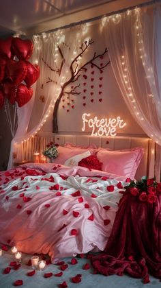 a bed with pink sheets and red pillows on it, surrounded by lights that read forever love