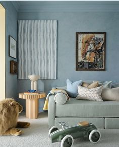 a living room filled with furniture and toys