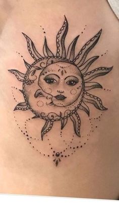 a sun tattoo on the side of a woman's stomach