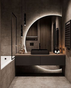 a bathroom with a sink, mirror and bathtub in it's center area