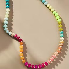 Indulge in luxury with our Rainbow Stone Necklace, featuring a stunning mix of beads in vibrant colors. Unleash your inner artist with our Rainbow Necklace. Length 16' with 1 1/2' gold extender and lobster claw clasp. This product was made by one of our partner companies. Cheap Rainbow Necklaces With Colorful Beads, Adjustable Rainbow Necklaces With Polished Beads, Adjustable Rainbow Polished Beads Necklace, Adjustable Rainbow Faceted Beads Necklace, Colorful Adjustable Beaded Necklace With Polished Beads, Colorful Adjustable Beaded Necklaces With Polished Beads, Adjustable Rainbow Single Strand Beads, Adjustable Single Strand Rainbow Beads, Adjustable Multicolor Single Strand Beaded Bracelet