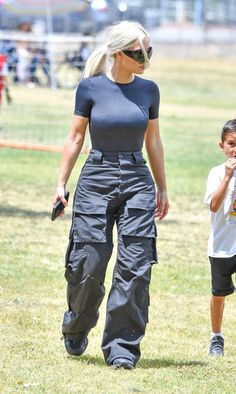 Soccer mom Kim Kardashian wore casual Balenciaga Cargo Pants at her son's game – The Nines Kim Kardashian 2022 Outfits, Cool Mom Outfits Fall, Soccer Outfit